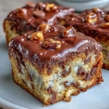 Cadbury Egg Blondies with White Chocolate Drizzle: golden, chewy blondies studded with Cadbury Mini Eggs and finished with a glossy white chocolate drizzle.