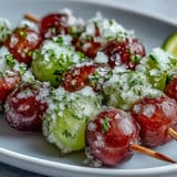 Zesty lime sugar-coated frozen grapes on skewers, perfect for hot days and easy entertaining.
